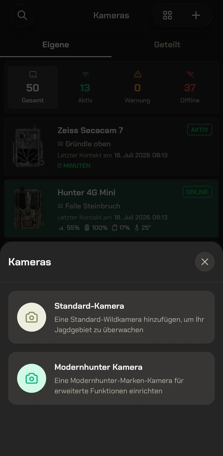 Modernhunter App: Kameraübersicht mit geöffnetem Auswahlmenü „Standard-Kamera" und „Modernhunter Kamera"